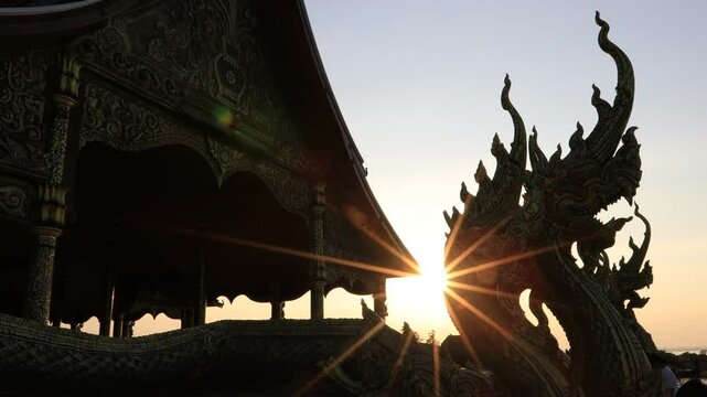 Background of the video of a religious tourist attraction, Wat Phra That Nong Bua, Ubon Ratchathani Province, Thailand. The beauty of the temple and the beautiful sculptures.