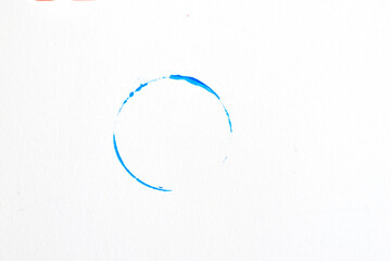 Abstraction. Semicircle applied with acrylic blue paint on a white background.