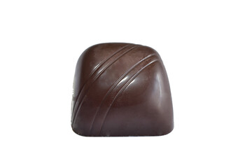 Chocolate candy with filling lies on a white background.