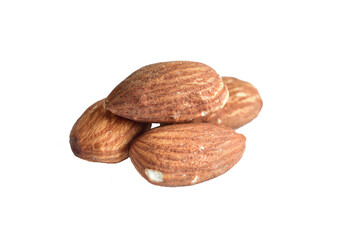 Several almonds lie in a pile on a PNG background.