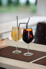 A glass of fresh delicious sangria on the table in the restaurant