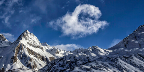 Snow covered mountains in winter. Snow mountan peak landscape