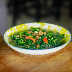 indonesian dishes called cha bayam spinach