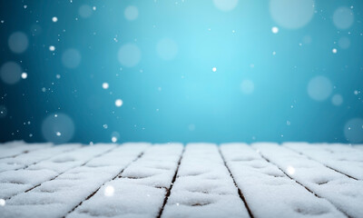 Wooden snow-covered surface on blue bokeh background. Winter holiday backdrop. Christmas background with copy space for card, wallpaper, template, banner, flyer