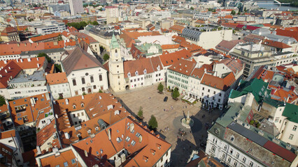 Obraz premium Bratislava's hlavné námestie with its historic buildings and red rooftops, aerial view