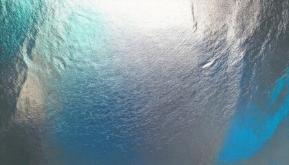 Beautiful Iridescent Silver Foil Texture. Pearlescent, Holographic, Pastel, Metallic Background. Wallpaper.