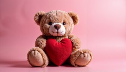 Adorable teddy bear holding a red heart on a pink background