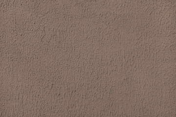 Old plaster surface, texture stucco background, close up grunge texture of brown painted cement, concrete wall texture. Wallpaper, backdrop, architecture design element