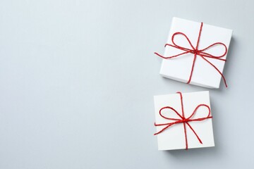 Beautiful gift boxes on gray background