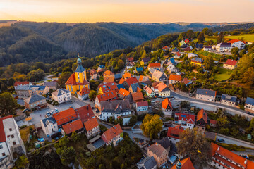 Village Hohnstein with Hohnstein castle and medieval half-timbered houses. Medieval building in...