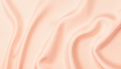 Fototapeta premium Soft satin fabric in pale peach color, elegant texture design