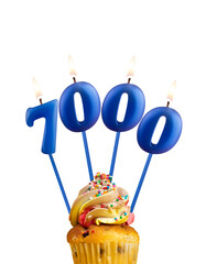 Number of followers or likes - Candle number 7000.