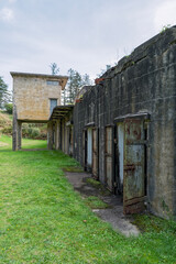 Obraz premium The exterior doors of an abandoned military bunker at Fort Columbia State Park, Washington, USA