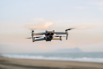 A drone flying over nature and making beautiful pictures and videos.