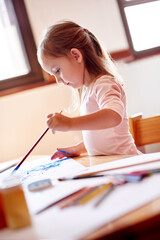 Painting, creative and art with girl in house for child development, drawing talent and education....