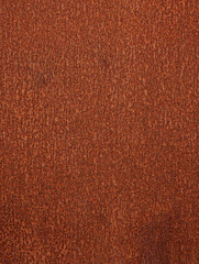 Fototapeta premium Close-up of house exterior iron door texture with rust effect. Brown and orange weathered rusty corroded metal finish surface.