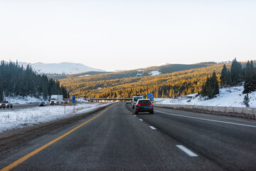 Vail, Colorado Western Slope interstate highway with snowcapped rocky mountains of Gore Range in...