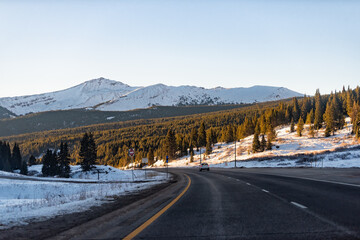 Colorado Western Slope interstate highway to Frisco with snowcapped rocky mountains of Gore Range...
