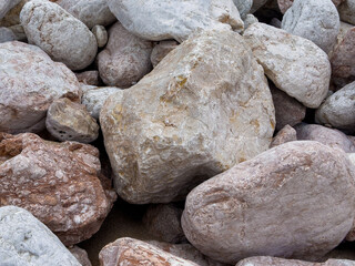 Pile of Large Weathered pink Rocks and Boulders 
