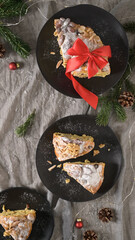 Festive Bolo Rainha slices on dark plates