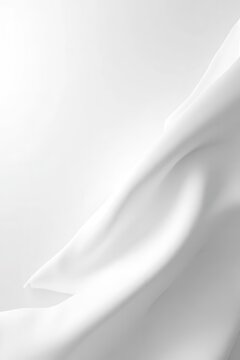 Soft White Fabric Draped Over a Smooth Surface with Gentle Curves