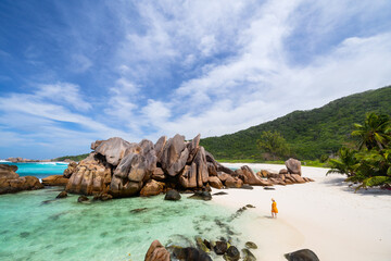 Woman on Anse Cocos beach