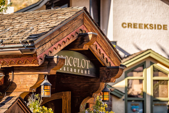 Vail, USA - October 6, 2022: Swiss style resort town in Colorado with sign closeup of Lancelot restaurant shop on Gore Creek drive and creekside