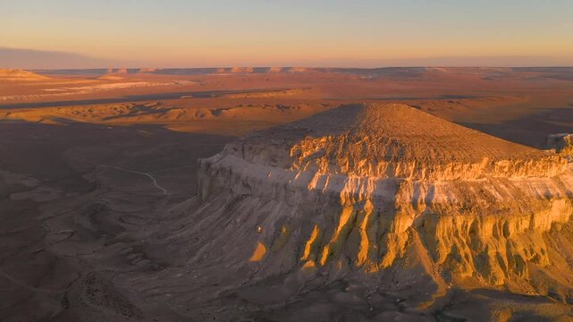 Stunning sunset over Aktau&rsquo;s cliffs highlights natures beauty. 