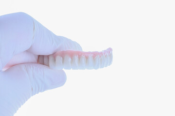 Dental implant supported full arch porcelain dental prosthesis for edentulous jaws in dentistry. Intraosseous dental implant and full arch dental prosthesis treatment. smile makeover. © UniqDream
