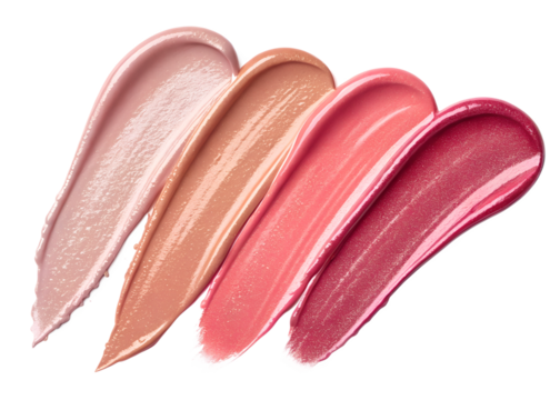 Vibrant swatches of lip gloss in various shades displayed on a white background showcasing color variety and texture for beauty enthusiasts