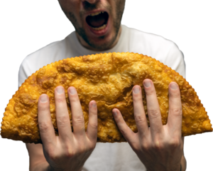 man about to bite huge cheburek, man holding big cheburek with both hands, street food deep fried pastry, Tatar cuisine