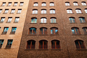 Modern residential house construction in a brick gothic style