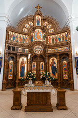 Intricate Wooden Altar with Iconography in a Church Interior