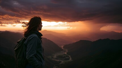 Epic Mountain Climber with Dramatic Sky Strength and Endurance