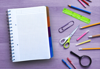 Blank page with space for text for Kids Drawing Memo to Do List on wood background with stationery....