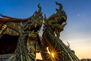 Background of the tourist attraction Wat Sirindhorn Wararam or the famous glowing temple in...