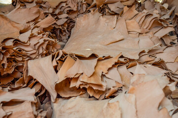 Natural leather in crafts stacked in a craft shop in the souk at Marrakech