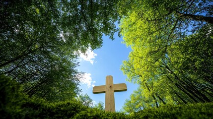 Wooden Cross Among Lush Green Trees Against Blue Sky