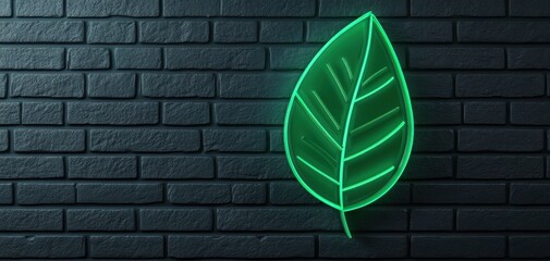 Obraz premium A vibrant neon leaf illuminates a dark brick wall, symbolizing nature's beauty in a modern aesthetic.