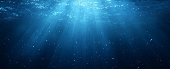 Underwater sunbeams, ocean depth, background particles, serene backdrop