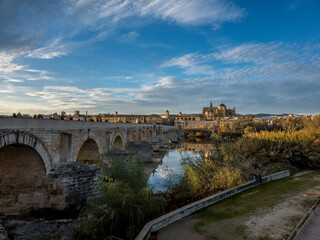 Cordoba Roman bridge over the river, Mosque Cathedral in the background in Spain 