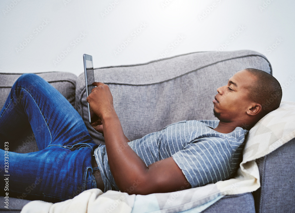 Poster relax, reading and man on sofa with tablet for university registration, research or checking email. 