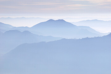 Obraz premium layers of mountains with fog
