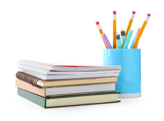 Stack of notebooks, books and other stationery on white background