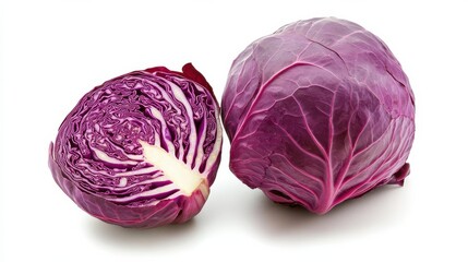 Fresh purple cabbage on white background - whole and halved vibrant veggie