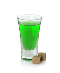 Absinthe in shot glass and brown sugar isolated on white