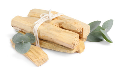 Palo santo sticks and eucalyptus branches isolated on white