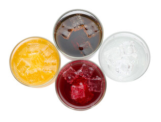 Soda water of different flavors with ice cubes in glasses isolated on white, top view