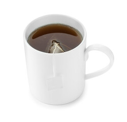 Tea bag in cup with hot drink isolated on white