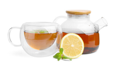 Tasty mint tea, lemon and fresh leaves isolated on white